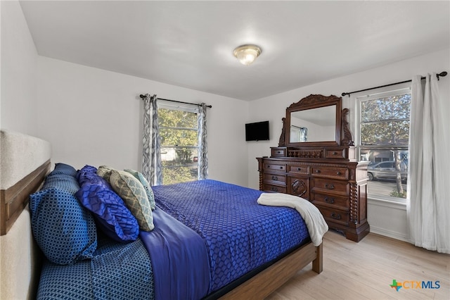 bedroom featuring light wood-type flooring