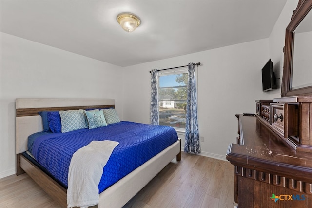 bedroom featuring light hardwood / wood-style floors