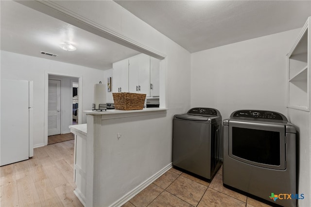 laundry room with washer and clothes dryer