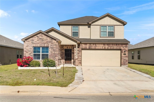 craftsman inspired home with a front yard and a garage