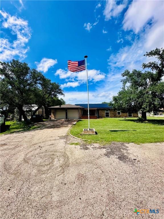 3043 Boys Ranch Rd, Kempner, TX 76539 - ranch-style house with a front lawn and driveway