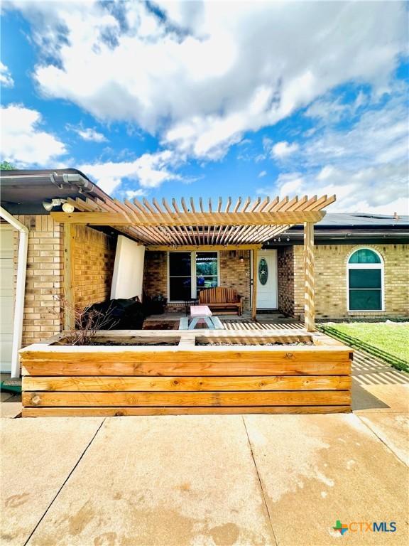 3043 Boys Ranch Rd, Kempner, TX 76539 - view of front of property featuring brick siding and a pergola