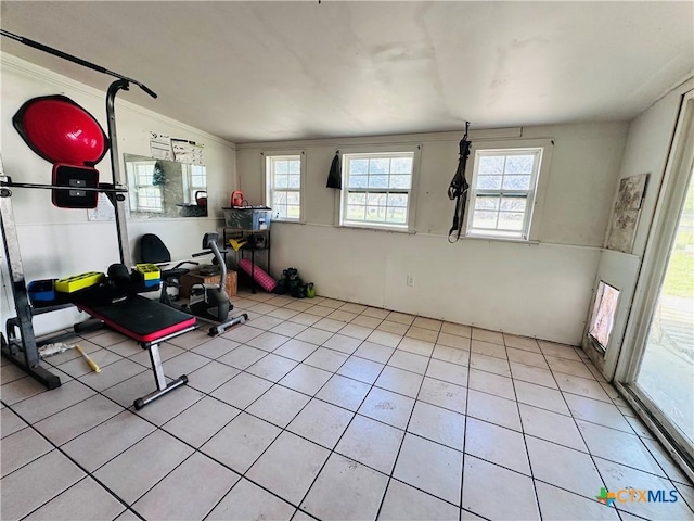 3043 Boys Ranch Rd, Kempner, TX 76539 - workout area with healthy amount of natural light, crown molding, and light tile patterned flooring