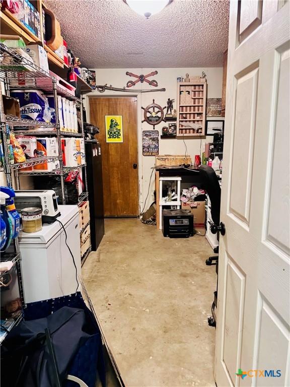 3043 Boys Ranch Rd, Kempner, TX 76539 - storage room featuring a ceiling fan