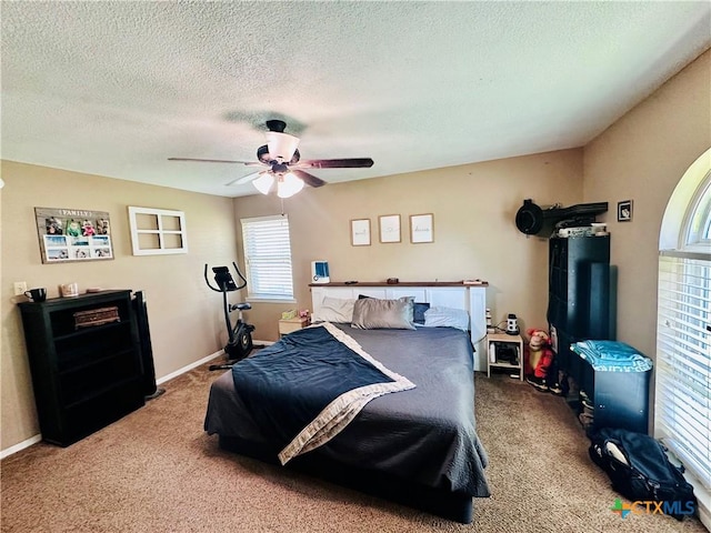 3043 Boys Ranch Rd, Kempner, TX 76539 - carpeted bedroom featuring a textured ceiling and a ceiling fan