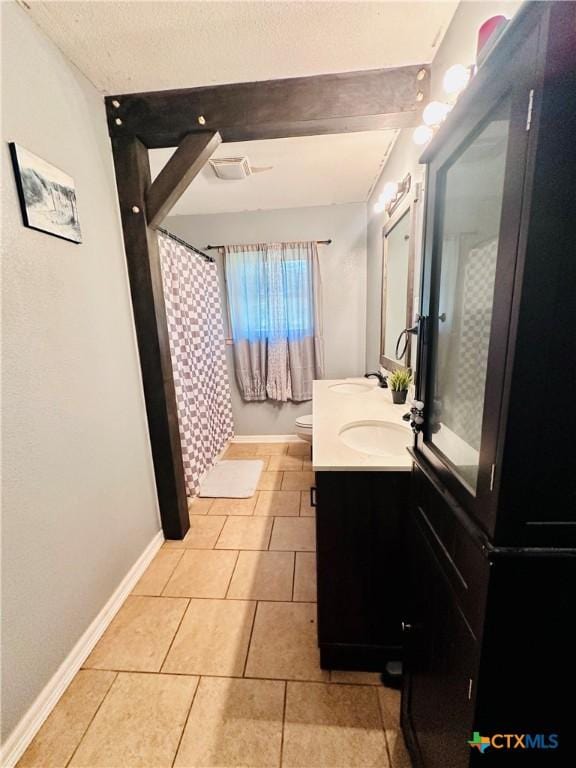 3043 Boys Ranch Rd, Kempner, TX 76539 - bathroom with double vanity and tile patterned flooring