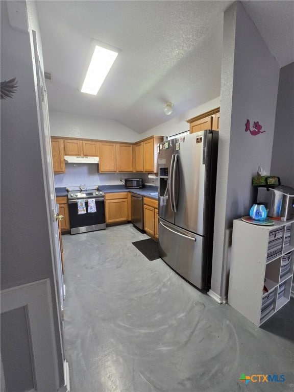 2814 Blackburn Dr, Killeen, TX 76543 - kitchen featuring appliances with stainless steel finishes, under cabinet range hood, lofted ceiling, and concrete flooring