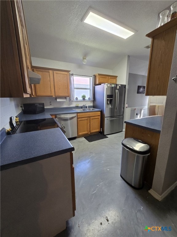2814 Blackburn Dr, Killeen, TX 76543 - kitchen with appliances with stainless steel finishes, dark countertops, concrete flooring, extractor fan, and a textured ceiling