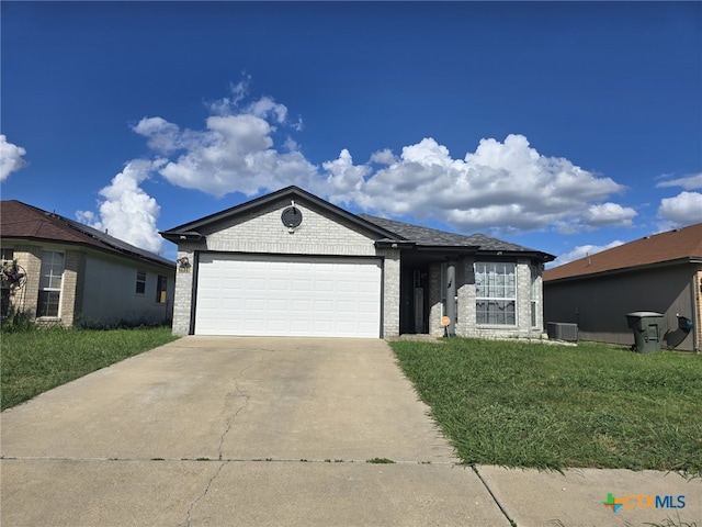 2814 Blackburn Dr, Killeen, TX 76543 - single story home with an attached garage, concrete driveway, a front lawn, and brick siding