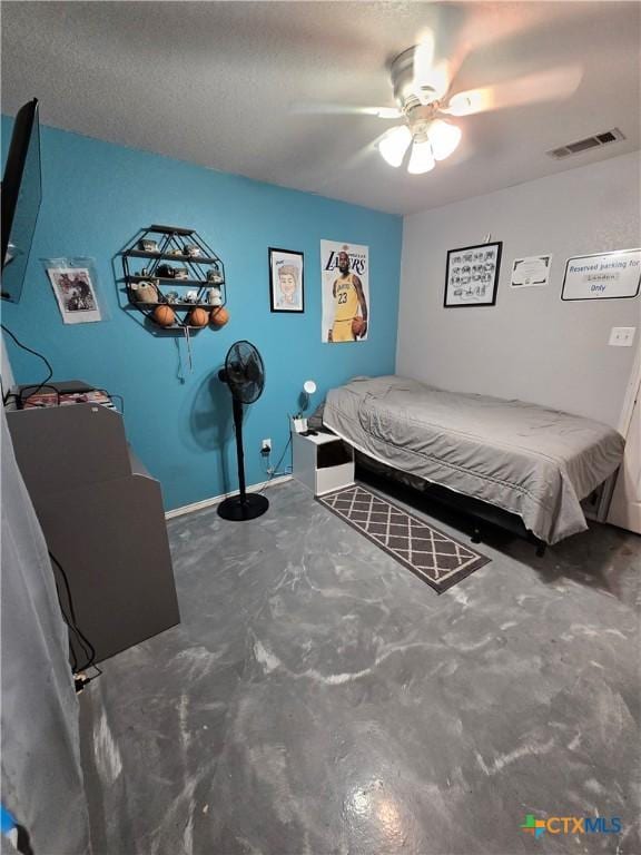 2814 Blackburn Dr, Killeen, TX 76543 - bedroom featuring concrete floors, a ceiling fan, and a textured ceiling