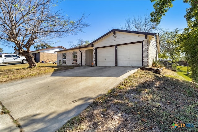 ranch-style home with a garage