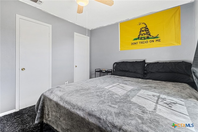 carpeted bedroom featuring ceiling fan