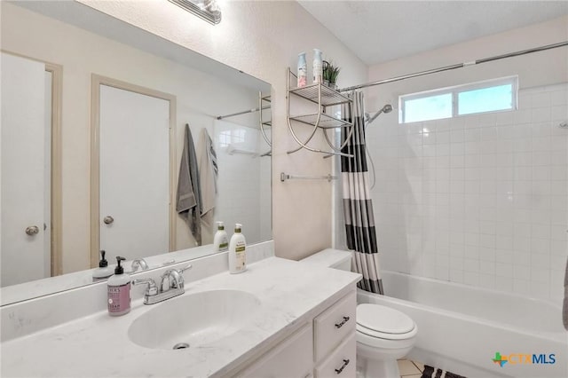 full bathroom featuring vanity, toilet, and shower / bath combo with shower curtain