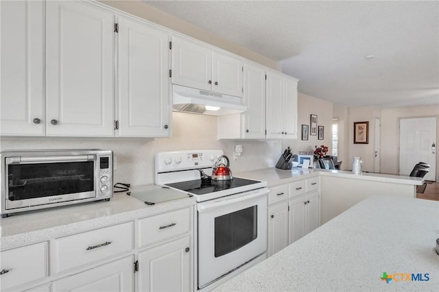 kitchen featuring a textured ceiling, white range with electric stovetop, white cabinetry, and kitchen peninsula