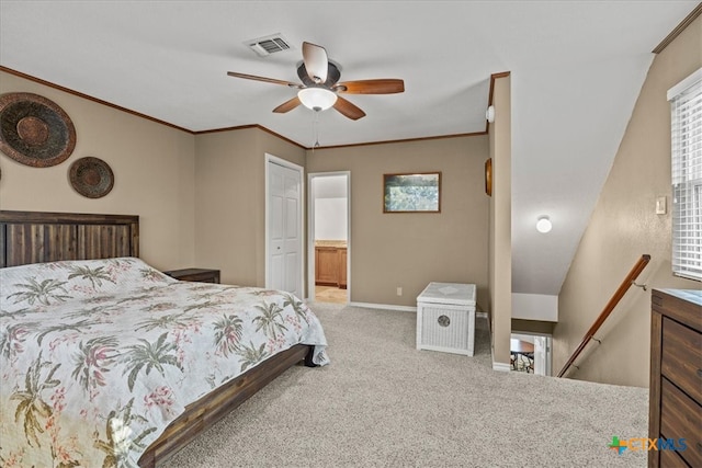 carpeted bedroom with baseboards, visible vents, ceiling fan, and ornamental molding