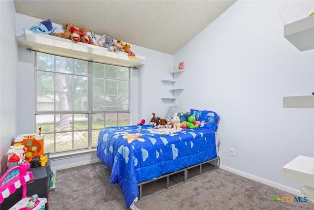 606 Brazos Dr, Temple, TX 76504 - bedroom with carpet floors, multiple windows, and vaulted ceiling