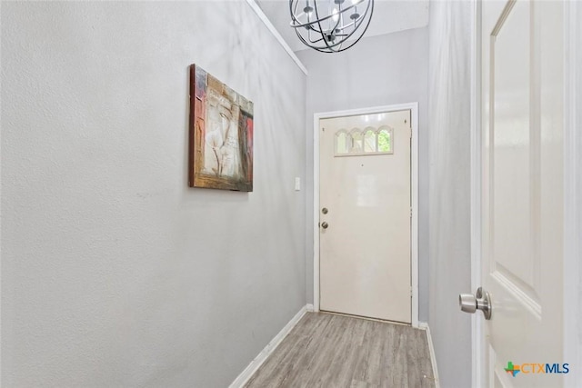 606 Brazos Dr, Temple, TX 76504 - doorway featuring a chandelier and light wood-style flooring