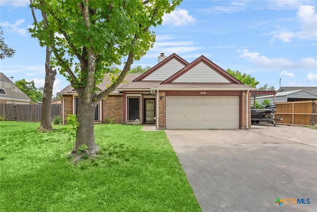 606 Brazos Dr, Temple, TX 76504 - view of front facade featuring a garage, brick siding, driveway, a chimney, and a shingled roof