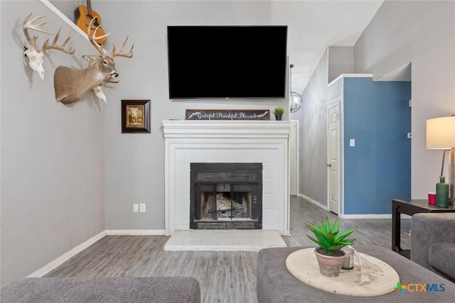 606 Brazos Dr, Temple, TX 76504 - living area featuring wood finished floors and a fireplace