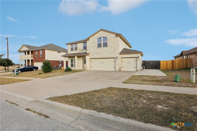 front of property featuring a garage