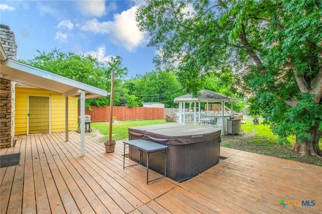 1109 Meadow Dr, Killeen, TX 76549 - wooden terrace featuring a hot tub, a gazebo, and fence