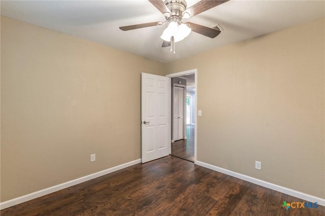 1109 Meadow Dr, Killeen, TX 76549 - spare room with dark wood-style floors, baseboards, and a ceiling fan