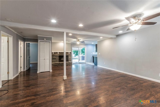 1109 Meadow Dr, Killeen, TX 76549 - unfurnished living room featuring a ceiling fan, a stone fireplace, baseboards, wood finished floors, and recessed lighting