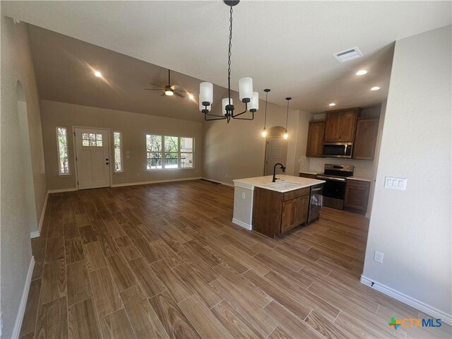 walk in closet featuring wood finished floors