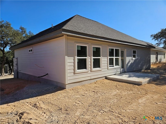 back of property featuring a patio area