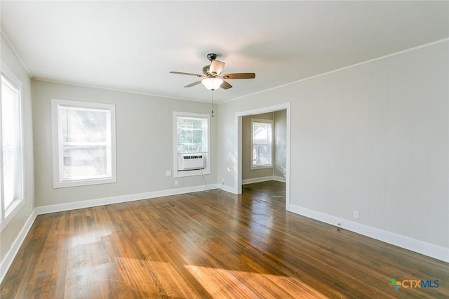 spare room with ceiling fan, dark hardwood / wood-style flooring, and plenty of natural light