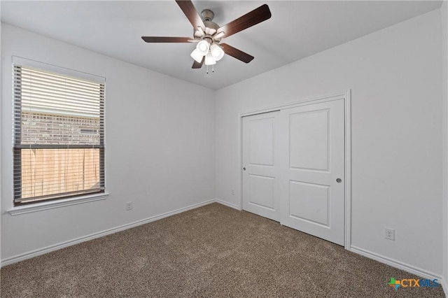 7310 Caladium Dr, Temple, TX 76502 - unfurnished bedroom featuring carpet floors, a closet, baseboards, and a ceiling fan
