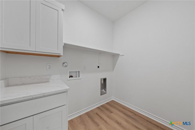 7310 Caladium Dr, Temple, TX 76502 - washroom with gas dryer hookup, light wood finished floors, electric dryer hookup, hookup for a washing machine, and baseboards