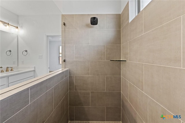 7310 Caladium Dr, Temple, TX 76502 - bathroom with tiled shower and vanity