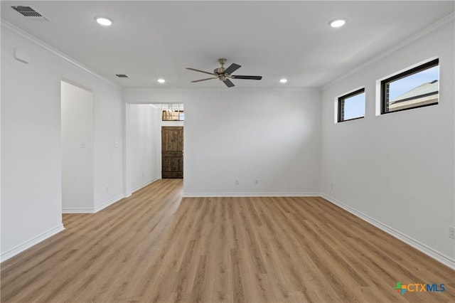 7310 Caladium Dr, Temple, TX 76502 - unfurnished room with crown molding, recessed lighting, light wood finished floors, ceiling fan, and baseboards