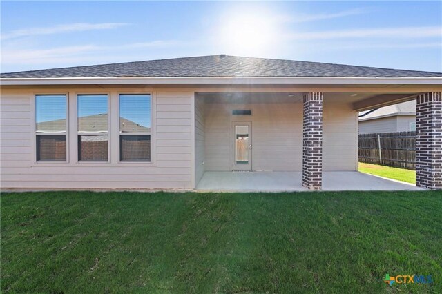 7310 Caladium Dr, Temple, TX 76502 - rear view of house featuring a patio area and roof with shingles