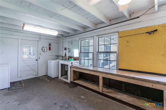 807 E 12th Ave, Belton, TX 76513 - below grade area featuring washer / clothes dryer, a workshop area, and plenty of natural light