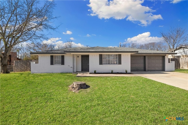 ranch-style house with a front lawn and a garage