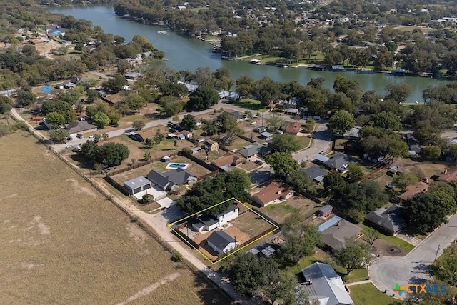 drone / aerial view featuring a water view