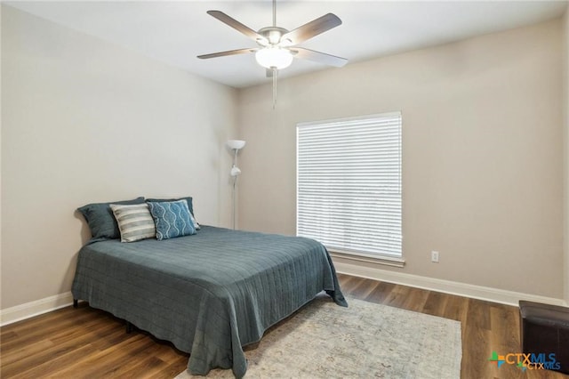 1100 Appalachian Trl, San Marcos, TX 78666 - bedroom with wood finished floors, baseboards, and a ceiling fan