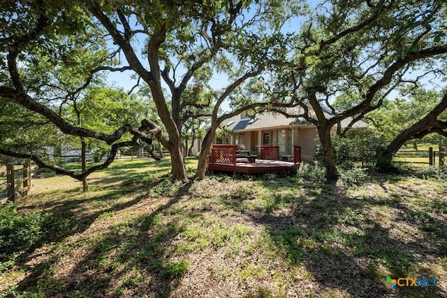 1100 Appalachian Trl, San Marcos, TX 78666 - view of yard with a wooden deck and fence