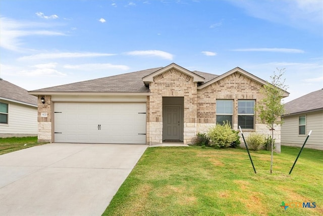 ranch-style home with a garage and a front yard