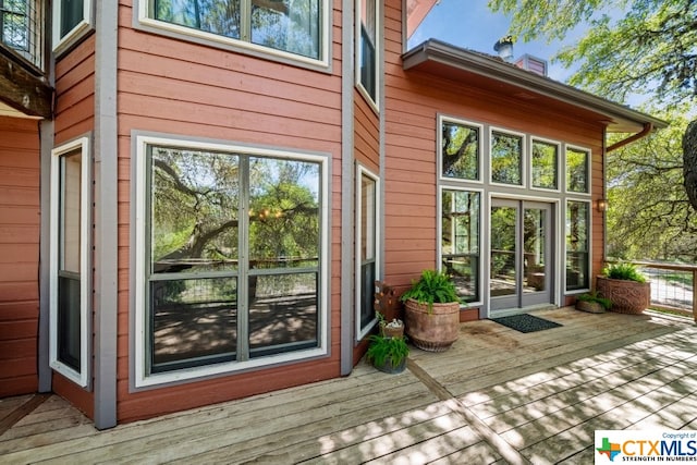 exterior space with a wooden deck