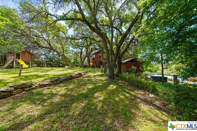 view of yard with a playground