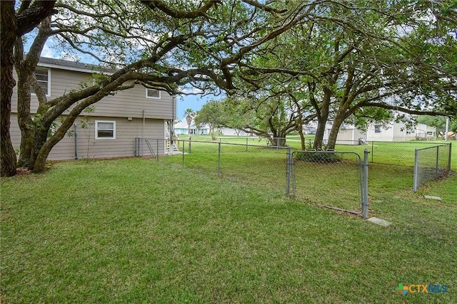 1551 Bayview Dr, Palacios, TX 77465 - view of yard featuring fence