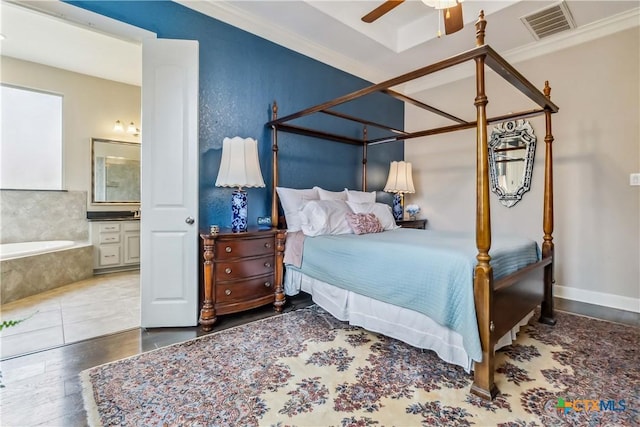 1404 Andalucia Dr, San Marcos, TX 78666 - bedroom with ensuite bath and ceiling fan