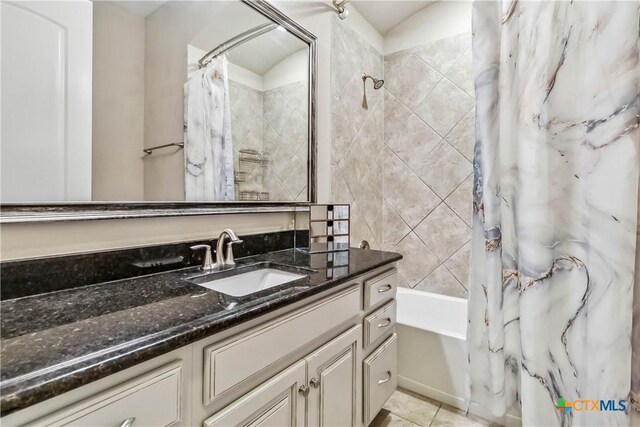 1404 Andalucia Dr, San Marcos, TX 78666 - full bathroom with shower / bath combination with curtain, vanity, and tile patterned floors