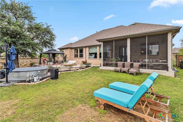 1404 Andalucia Dr, San Marcos, TX 78666 - back of property with a gazebo, a sunroom, roof with shingles, and a patio