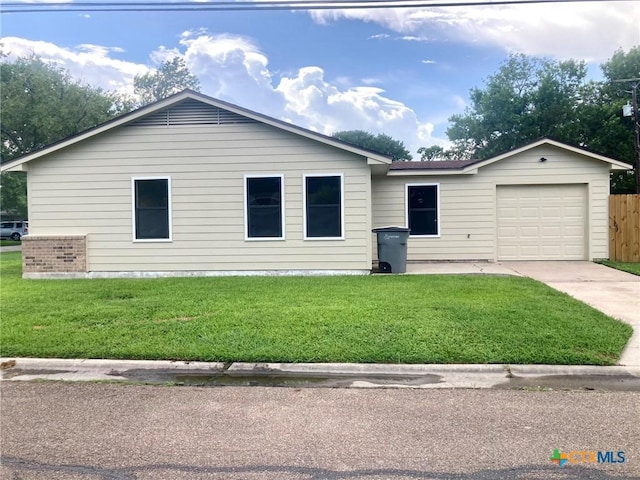 1502 Bowie Dr, Victoria, TX 77901 - single story home with an attached garage and driveway