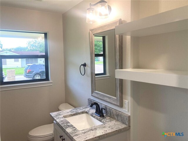 1502 Bowie Dr, Victoria, TX 77901 - half bath with plenty of natural light and vanity