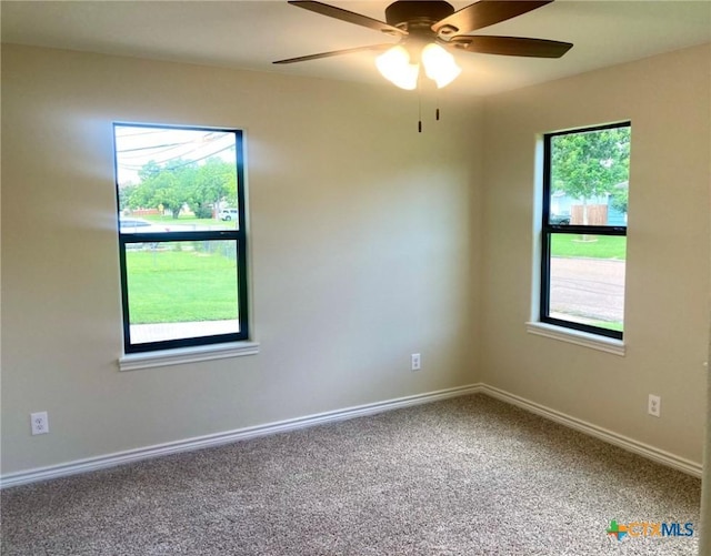1502 Bowie Dr, Victoria, TX 77901 - carpeted empty room with a ceiling fan and baseboards